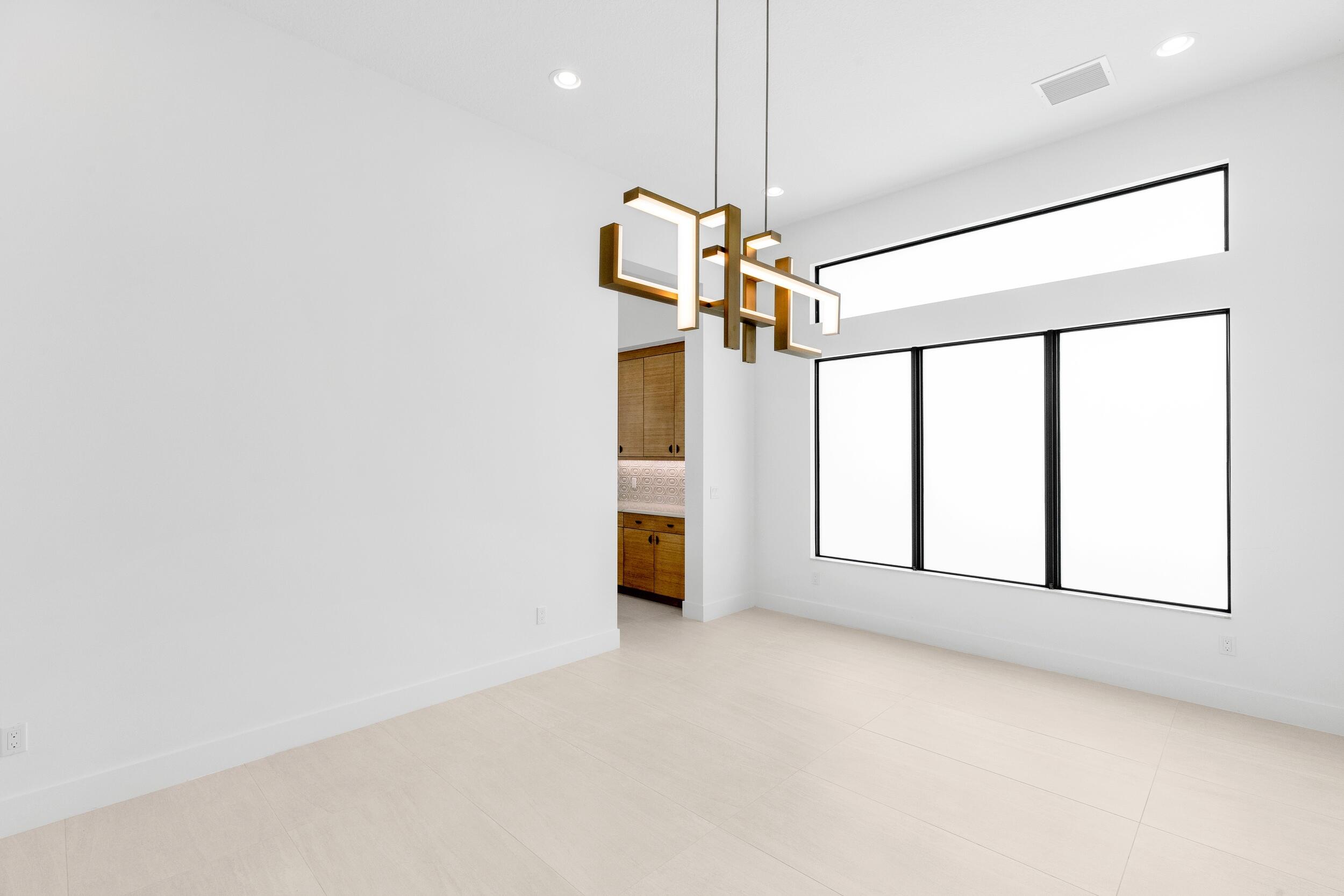 9893 Espresso Manor Boca Raton, FL 33496 - Photo 21 of 71 a view of a room with window and ceiling fan