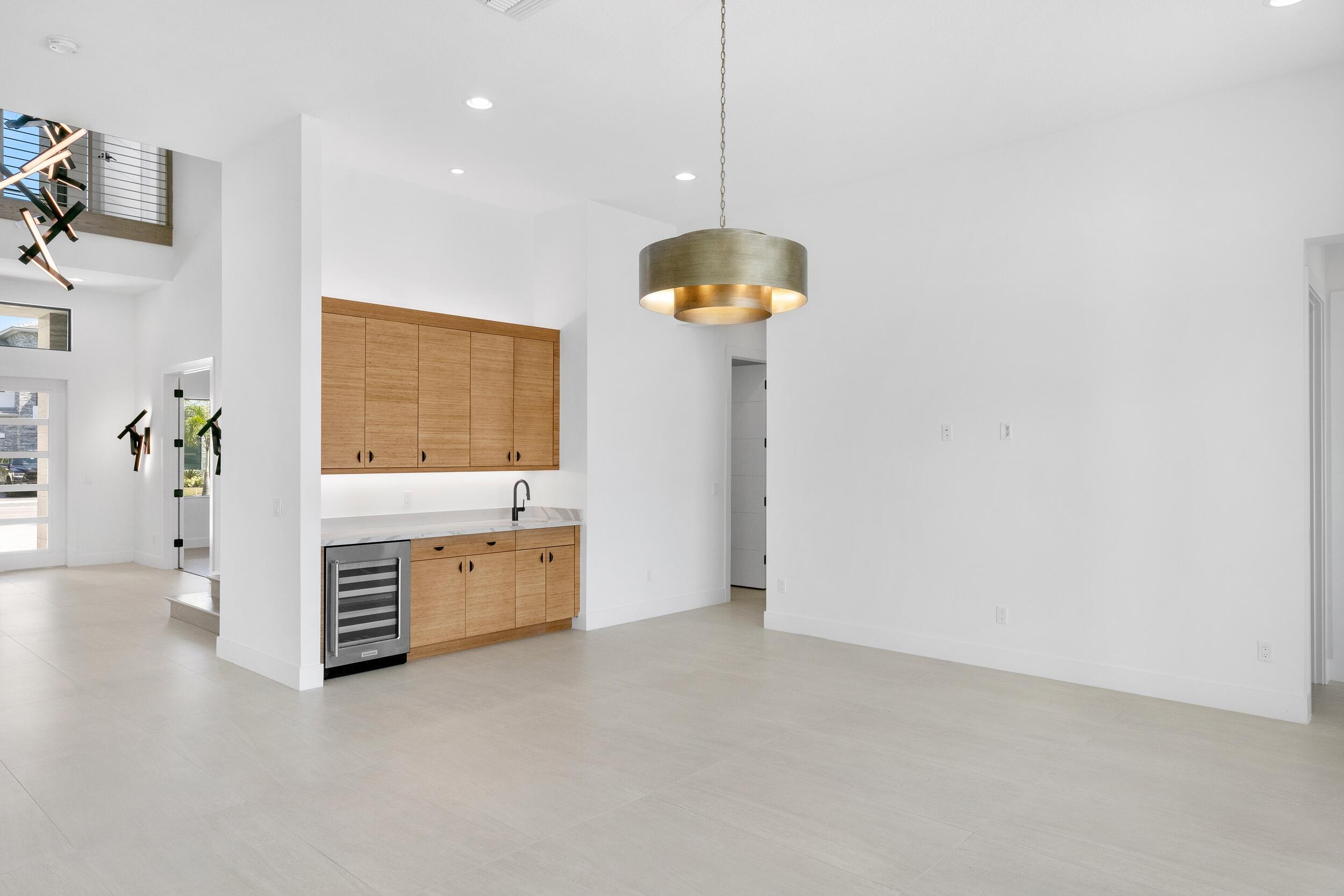 9893 Espresso Manor Boca Raton, FL 33496 - Photo 50 of 71 a spacious bathroom with a granite countertop sink a mirror and a bathtub