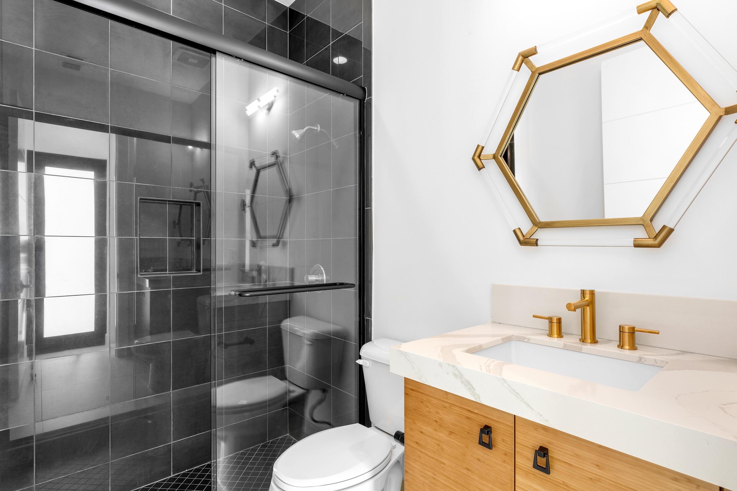 9893 Espresso Manor Boca Raton, FL 33496 - Photo 57 of 71 a bathroom with a sink a toilet and a mirror