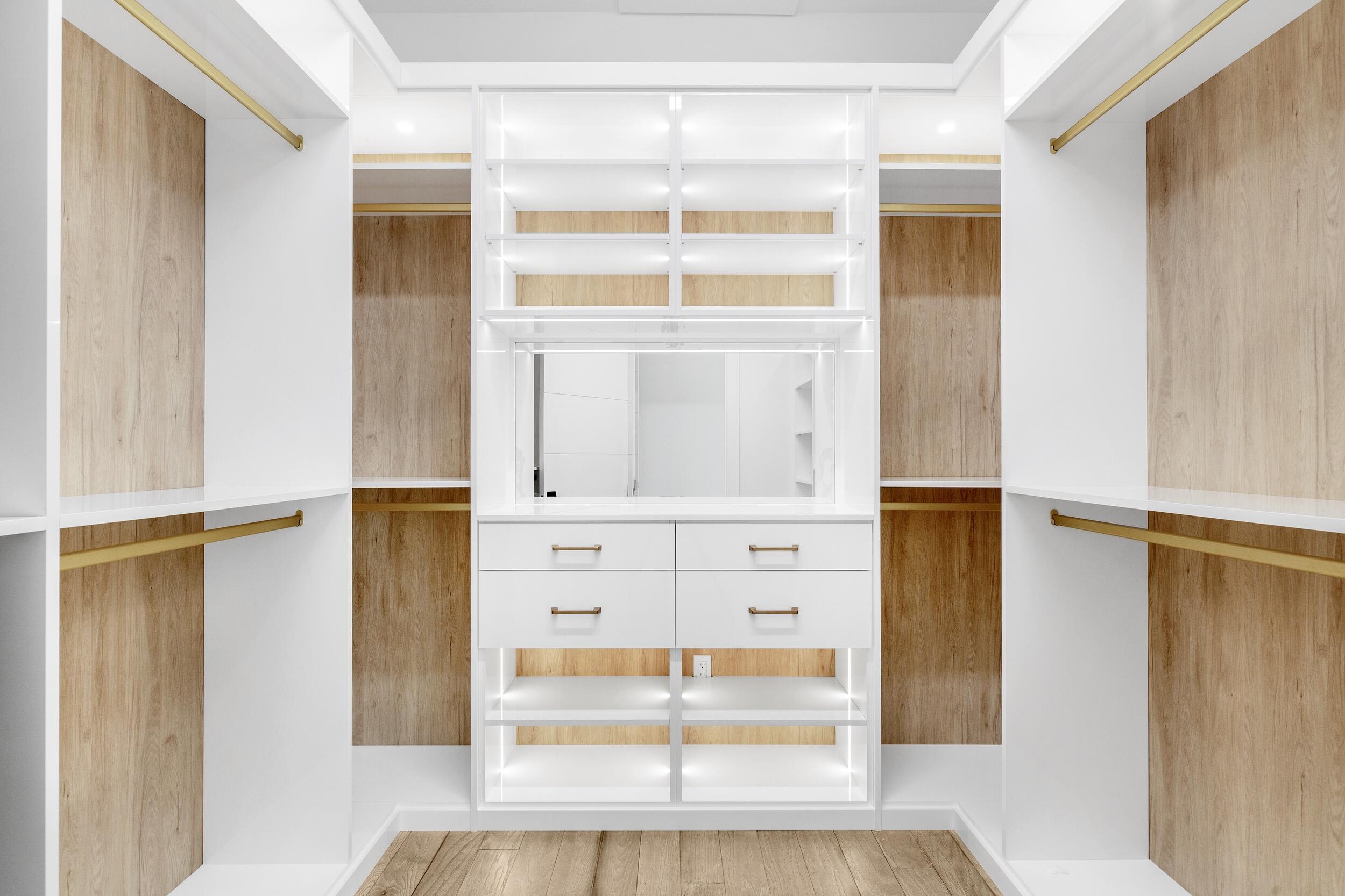 9893 Espresso Manor Boca Raton, FL 33496 - Photo 64 of 71 a view of walk in closet with empty racks