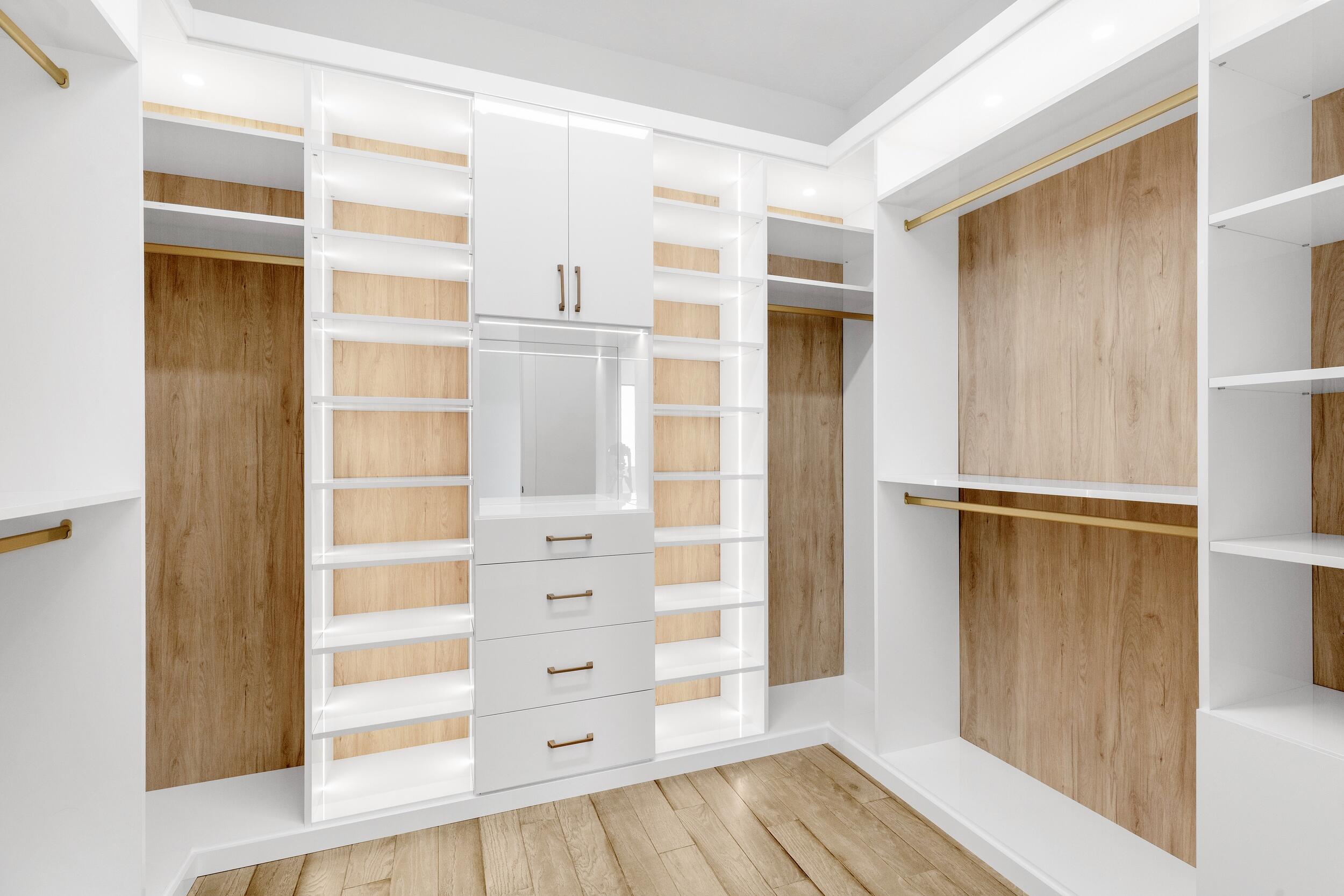 9893 Espresso Manor Boca Raton, FL 33496 - Photo 65 of 71 a view of closet area with empty racks