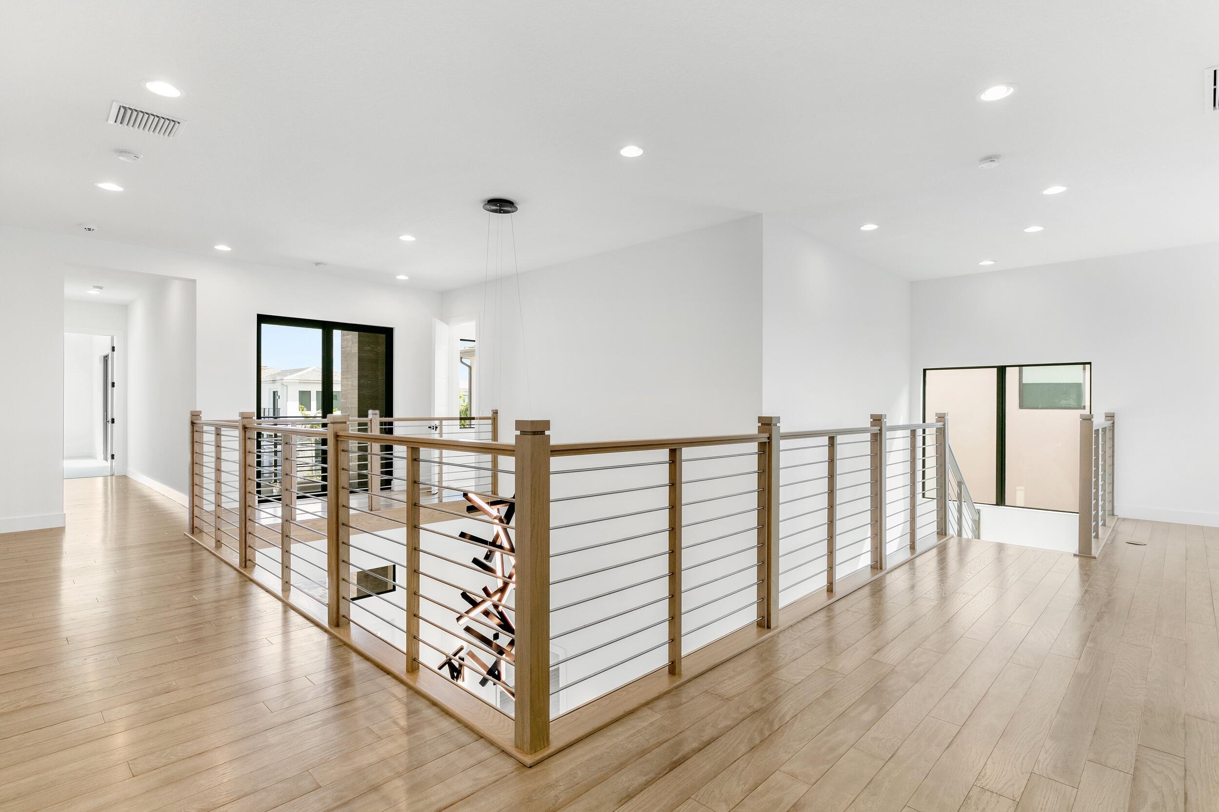 9893 Espresso Manor Boca Raton, FL 33496 - Photo 71 of 71 a view of a hallway with stairs