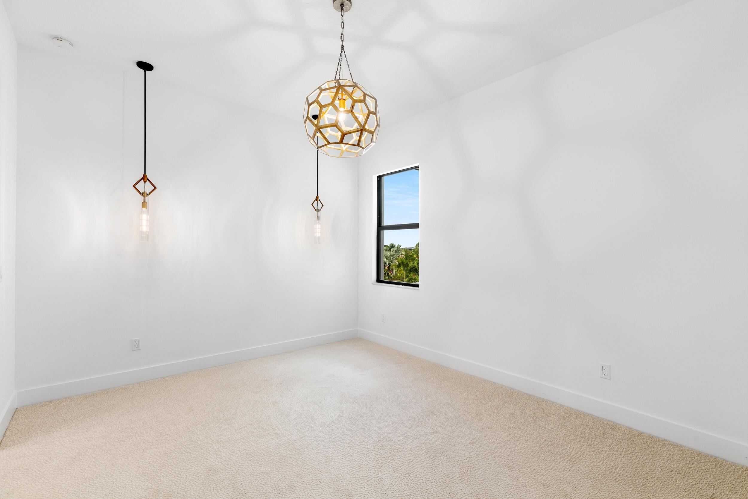 9893 Espresso Manor Boca Raton, FL 33496 - Photo 10 of 71 a view of an empty room with windows