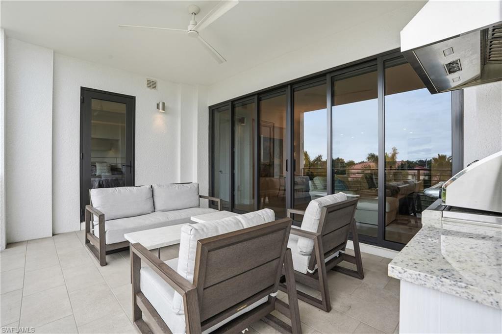 1125 Central Avenue, Unit 469 Naples, FL 34102 - Photo 36 of 38 a living room with furniture