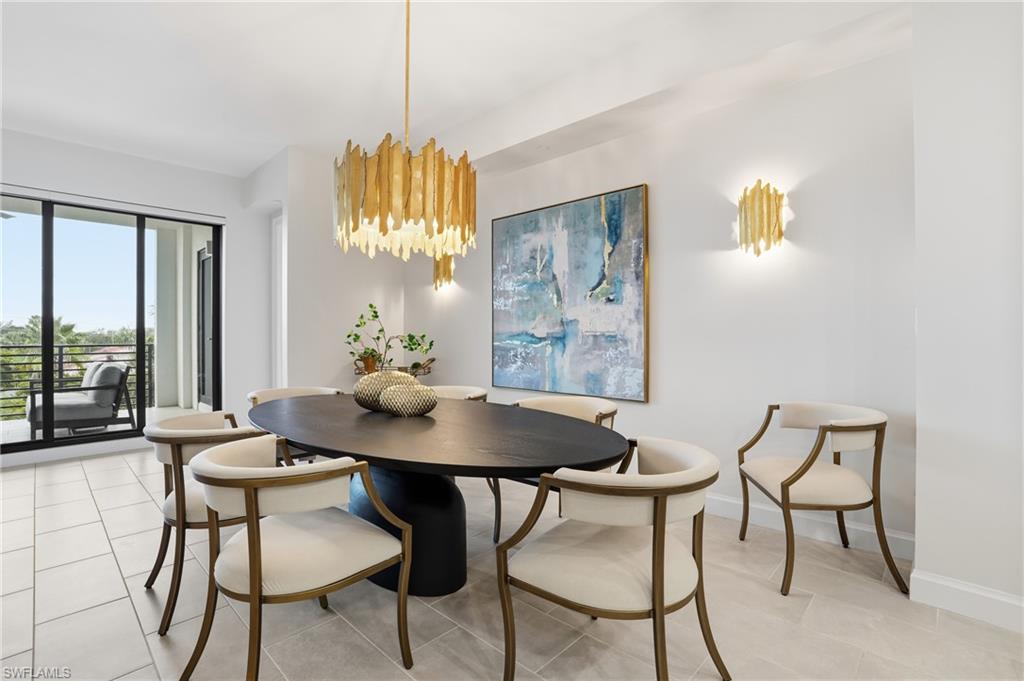 1125 Central Avenue, Unit 469 Naples, FL 34102 - Photo 4 of 38 a view of a dining room with furniture and window