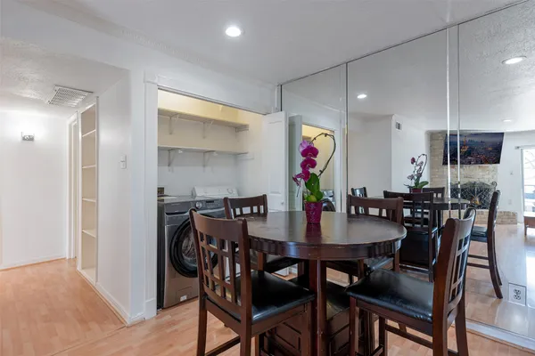 a view of a dining room and livingroom with furniture