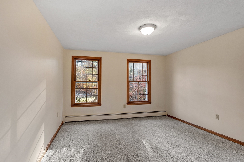 69 Blanchard Street Andover, MA 01810 - Photo 16 of 29 an empty room with windows