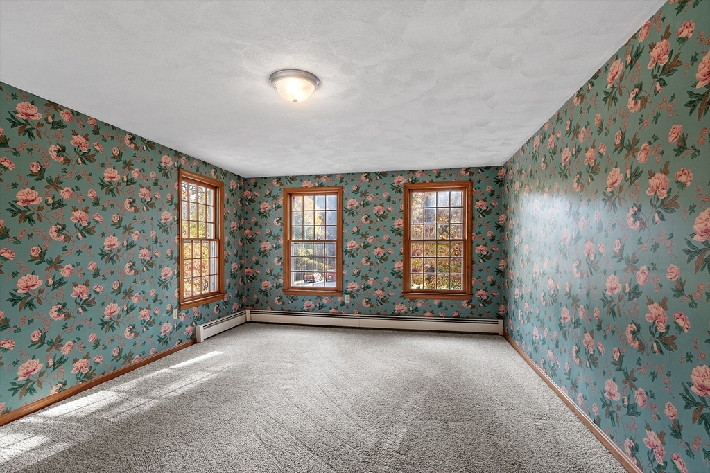 69 Blanchard Street Andover, MA 01810 - Photo 22 of 29 a view of an empty room with a window