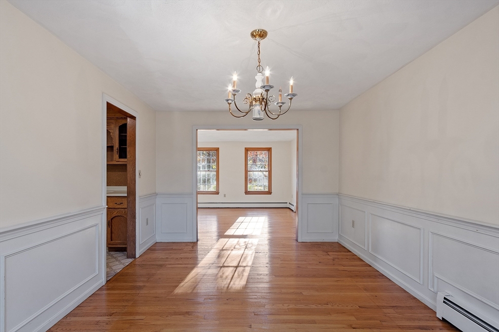 69 Blanchard Street Andover, MA 01810 - Photo 6 of 29 a view of entryway with wooden floor