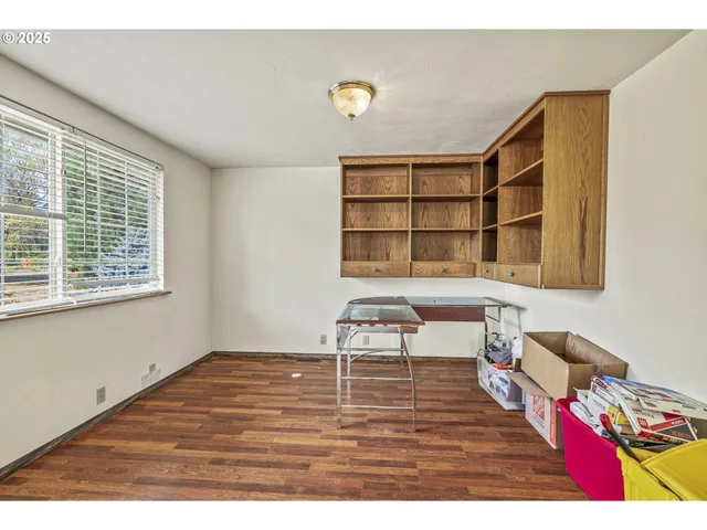 a room with furniture and a window