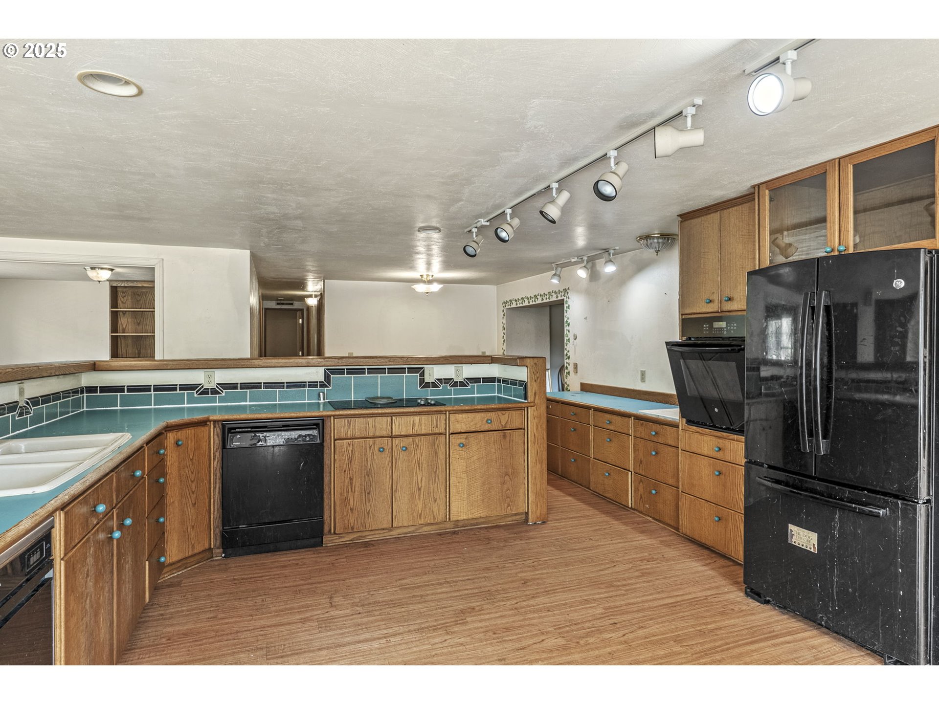 135 Westside Highway Vader, WA 98593 - Photo 20 of 31 a kitchen with stainless steel appliances granite countertop a stove a sink dishwasher and a refrigerator