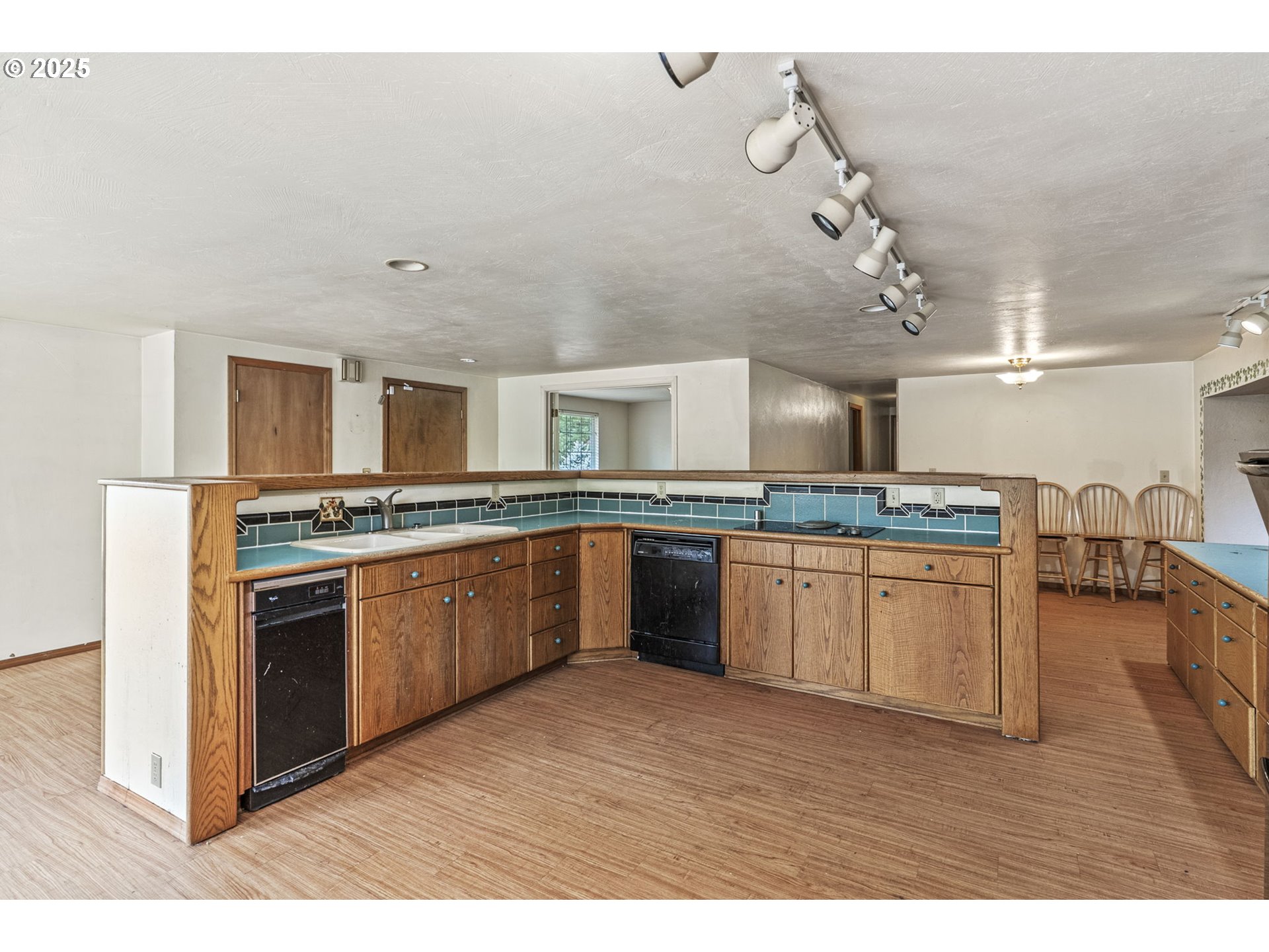 135 Westside Highway Vader, WA 98593 - Photo 21 of 31 a kitchen with stainless steel appliances granite countertop a stove and cabinets
