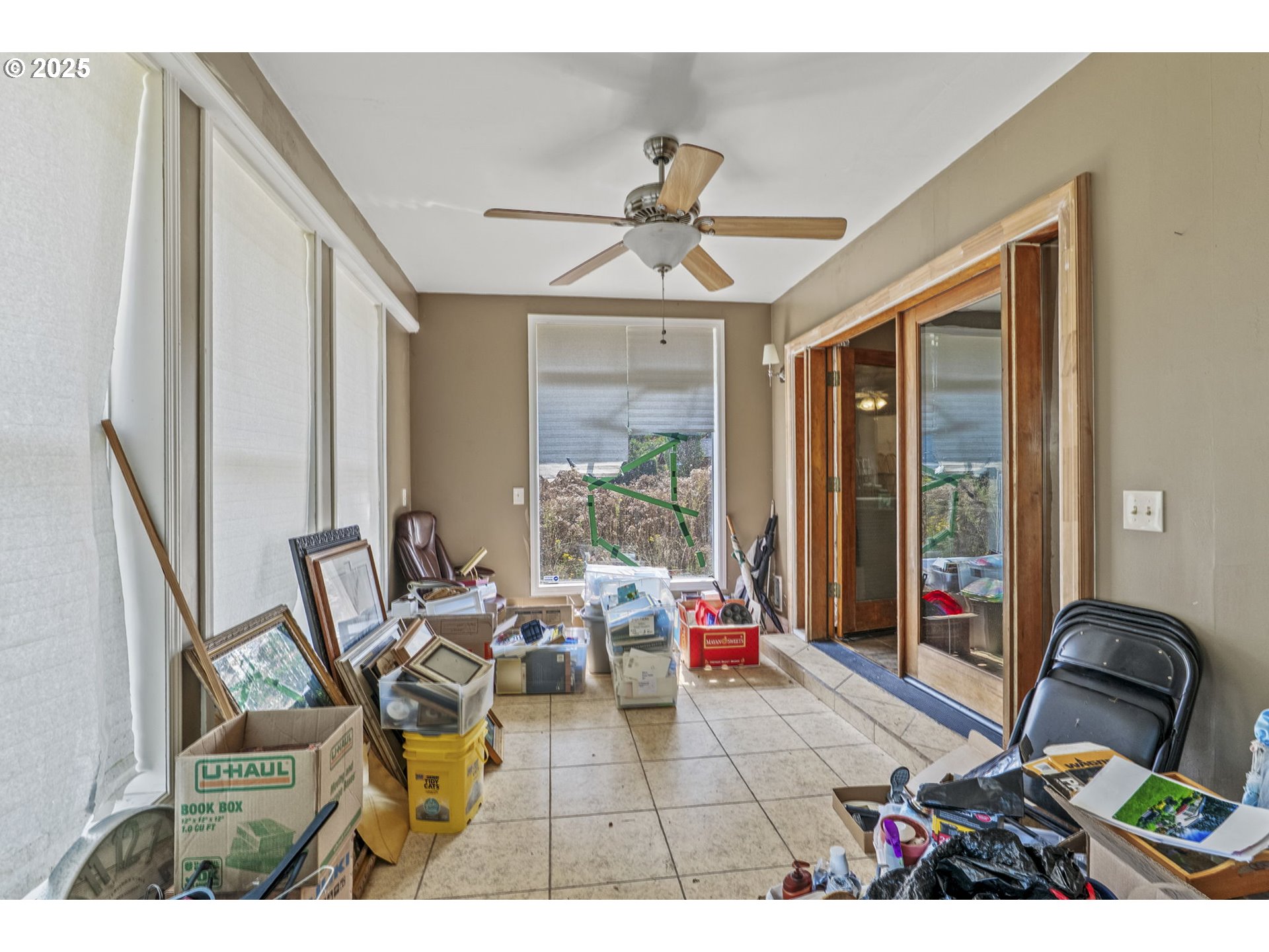 135 Westside Highway Vader, WA 98593 - Photo 22 of 31 a living room with furniture and a large window