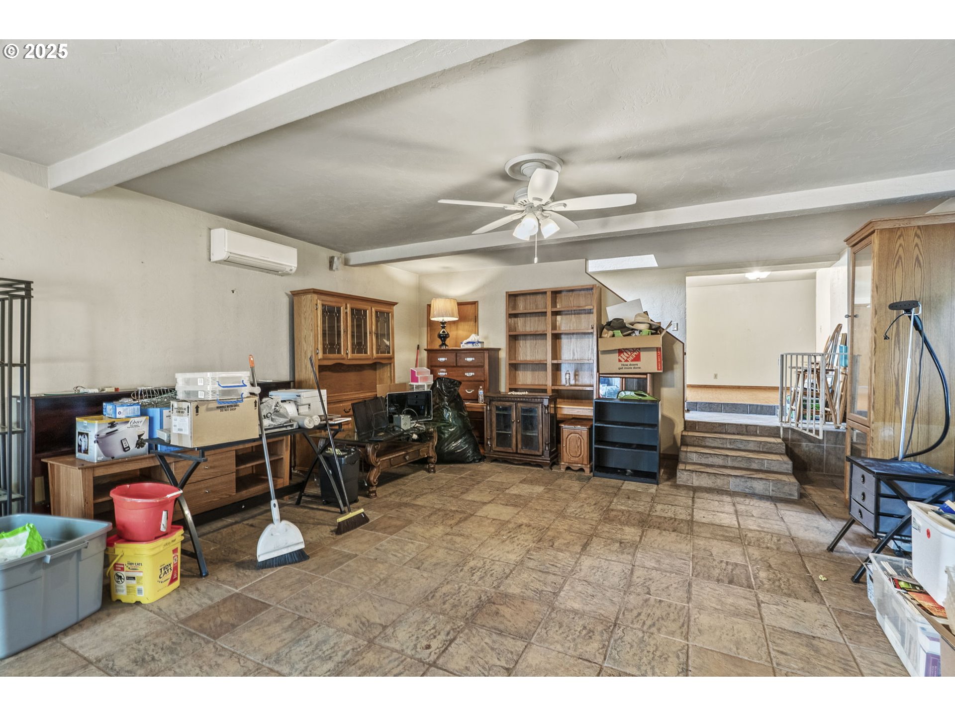 135 Westside Highway Vader, WA 98593 - Photo 24 of 31 a living room with lots of furniture and a chandelier