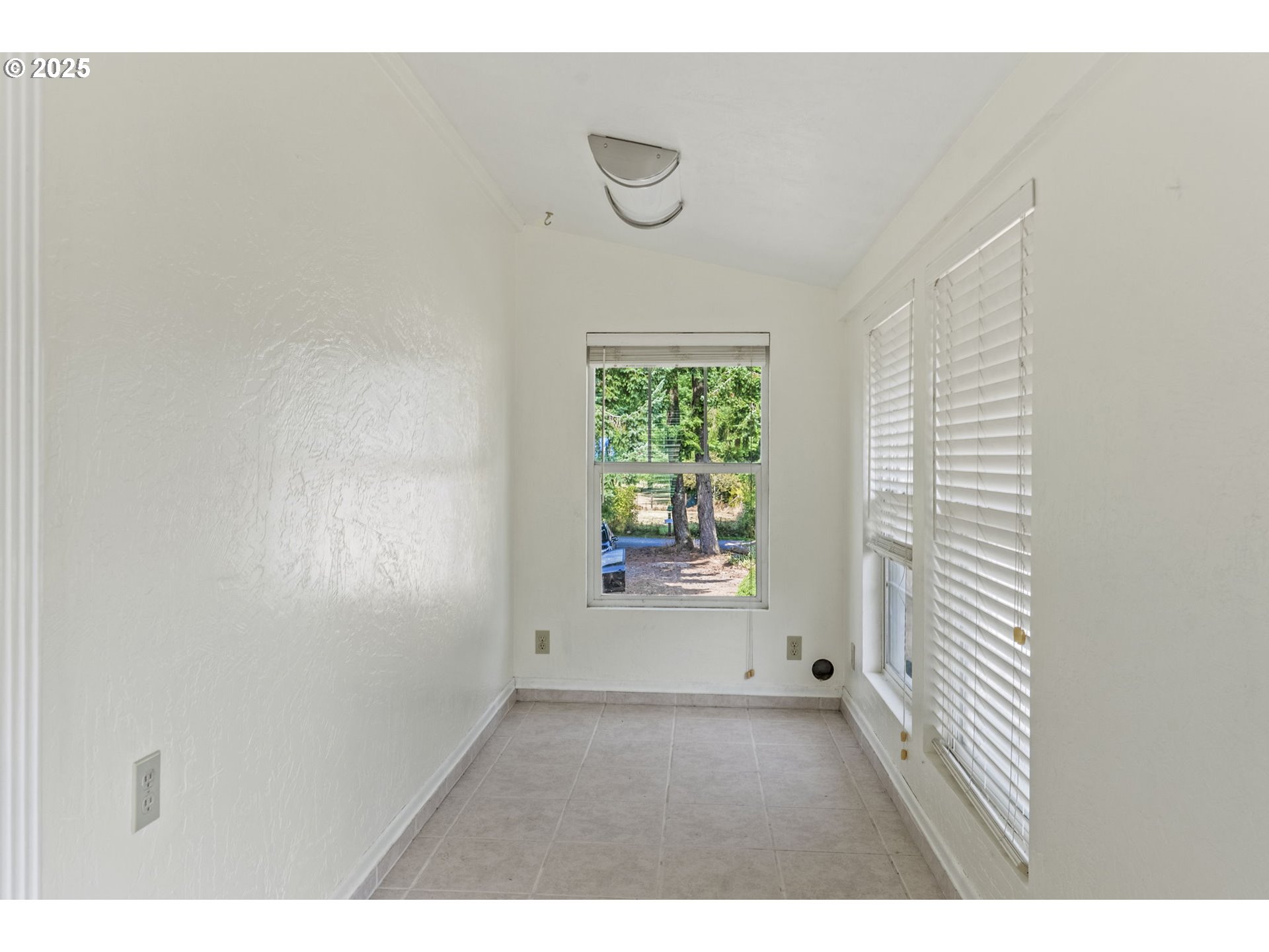 135 Westside Highway Vader, WA 98593 - Photo 27 of 31 a view of an empty room with a window