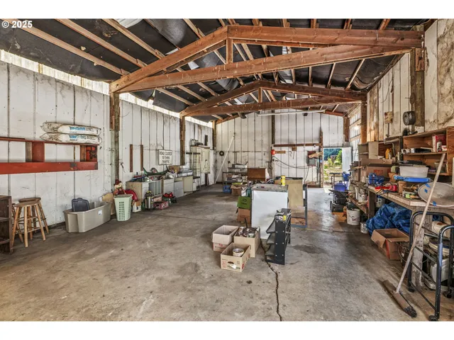 a view of a chairs and tables in a patio