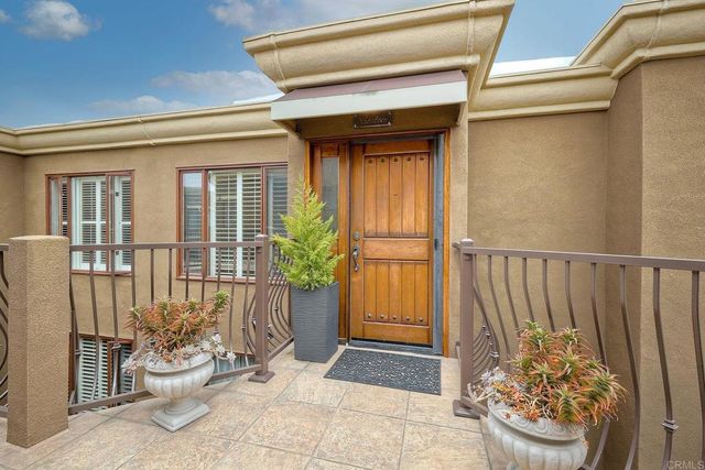 a view of a porch with seating space