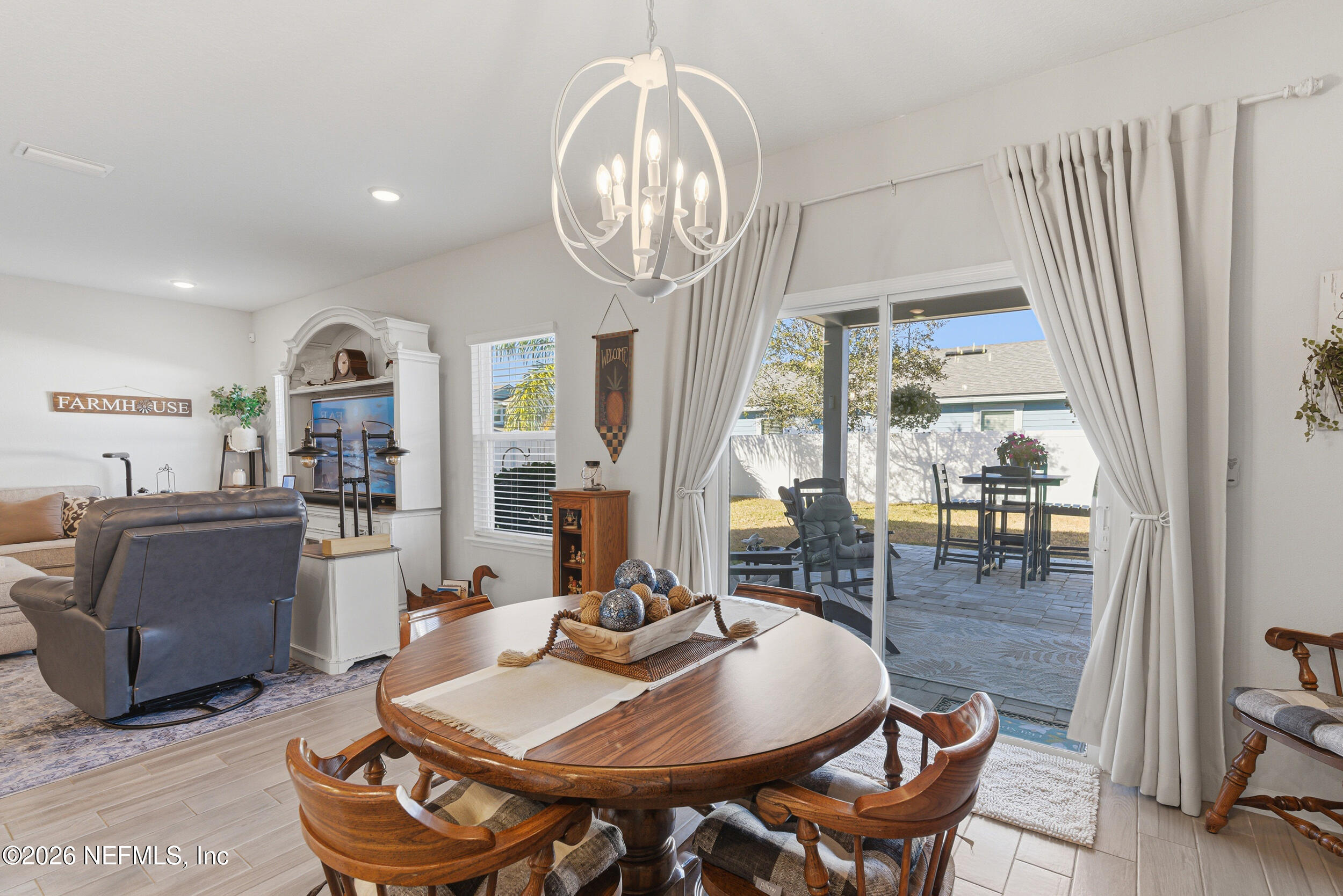 507 Narrowleaf Drive St. Johns, FL 32259 - Photo 15 of 79 a view of a dining room with furniture window and wooden floor