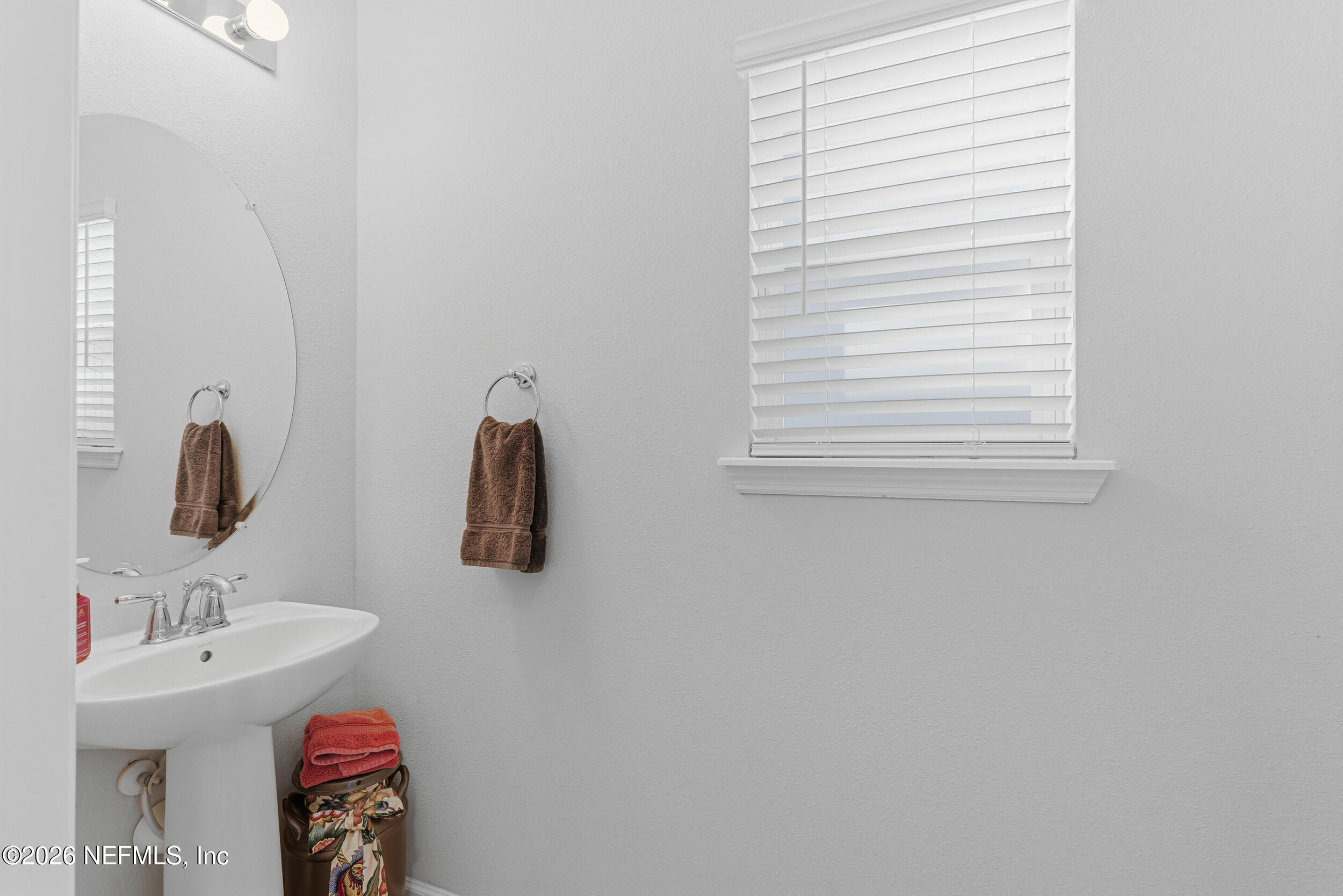507 Narrowleaf Drive St. Johns, FL 32259 - Photo 17 of 79 a bathroom with a sink and a mirror
