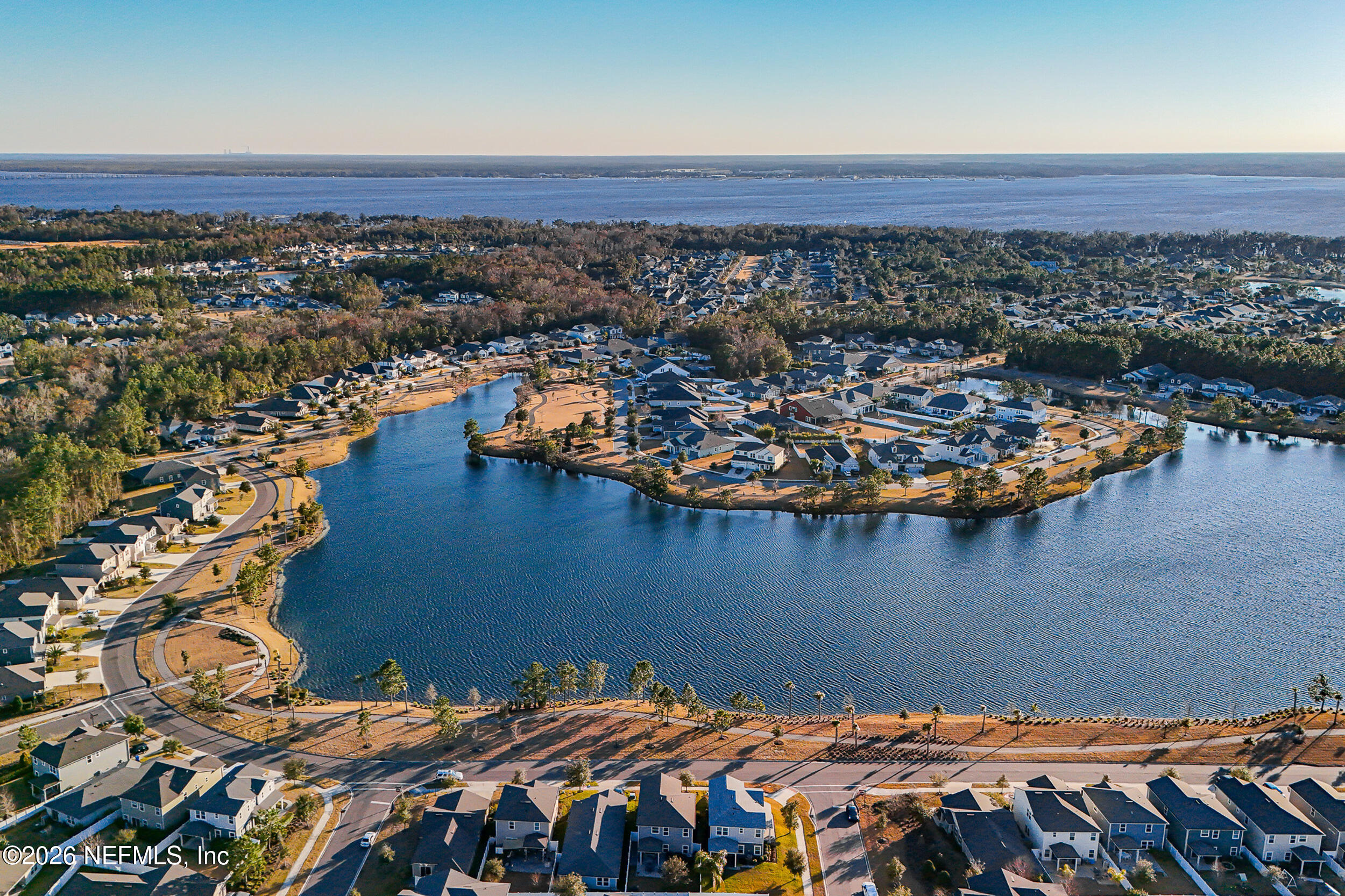 507 Narrowleaf Drive St. Johns, FL 32259 - Photo 39 of 79 an aerial view of a house with a lake view