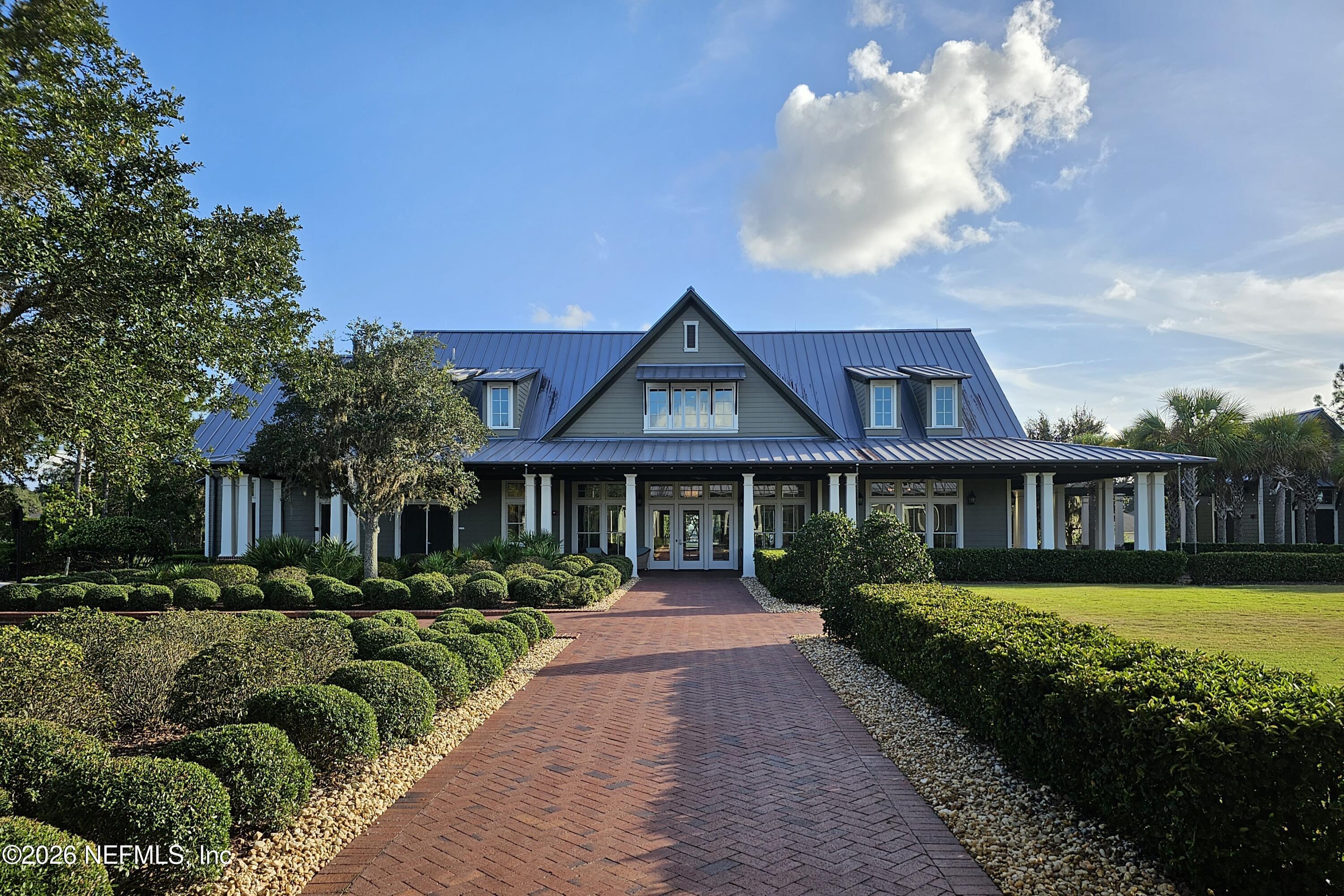 507 Narrowleaf Drive St. Johns, FL 32259 - Photo 59 of 79 a front view of a house with swimming pool having outdoor seating