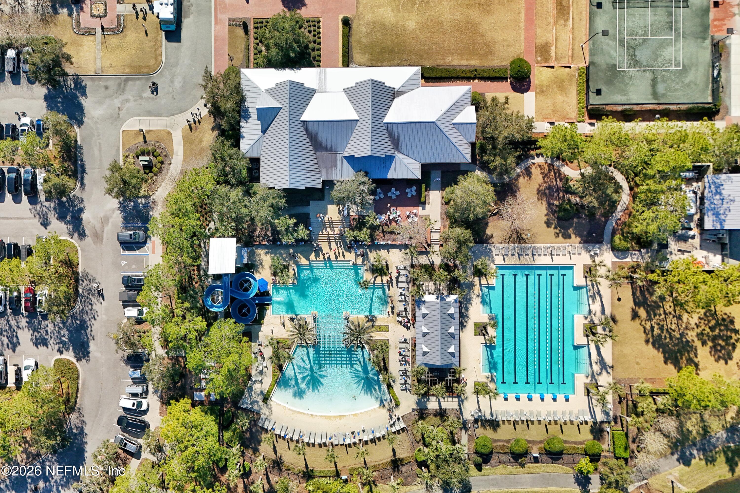 507 Narrowleaf Drive St. Johns, FL 32259 - Photo 61 of 79 a aerial view of a house with swimming pool and outdoor seating