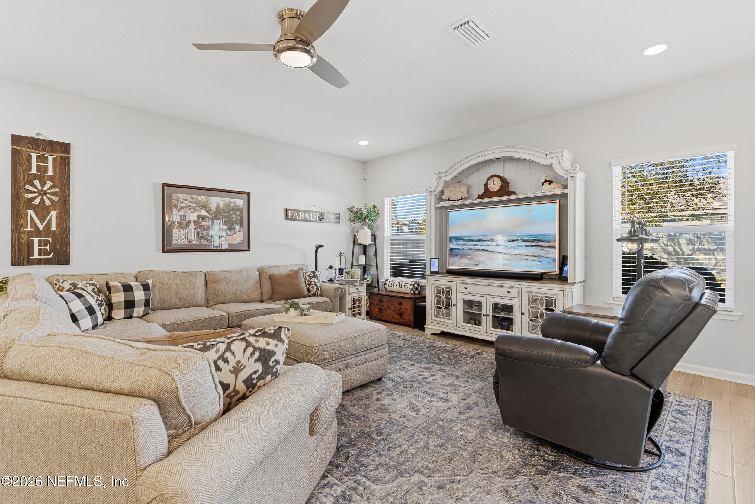 507 Narrowleaf Drive St. Johns, FL 32259 - Photo 6 of 79 a living room with furniture and a flat screen tv