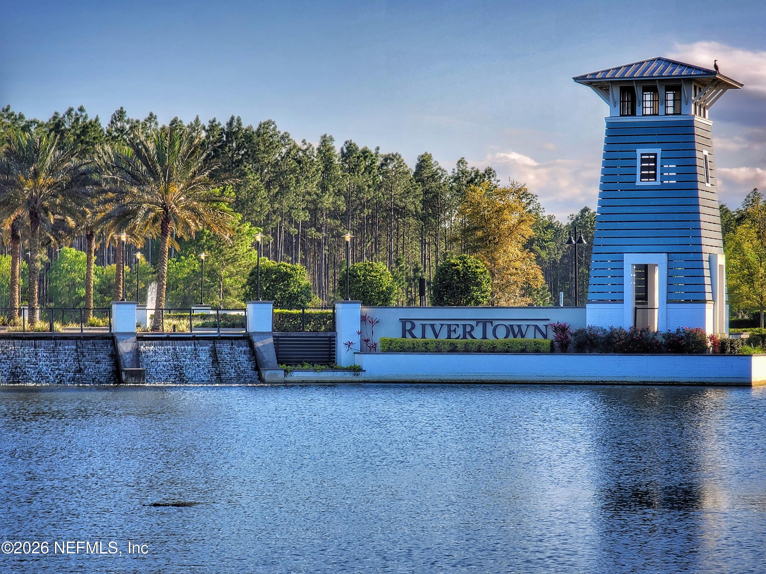 507 Narrowleaf Drive St. Johns, FL 32259 - Photo 72 of 79 a view of a swimming pool with a patio and a yard