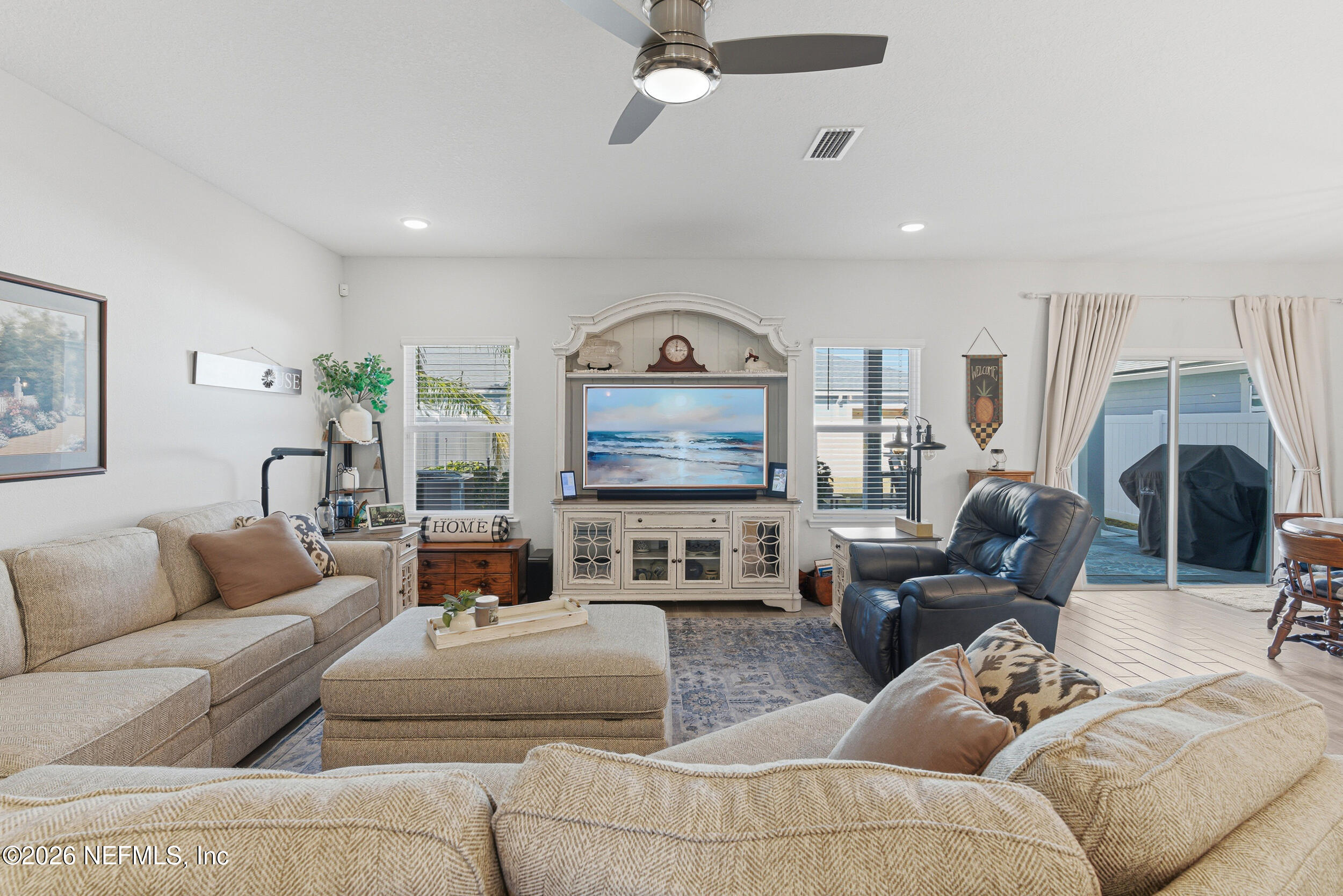 507 Narrowleaf Drive St. Johns, FL 32259 - Photo 7 of 79 a living room with furniture and a flat screen tv