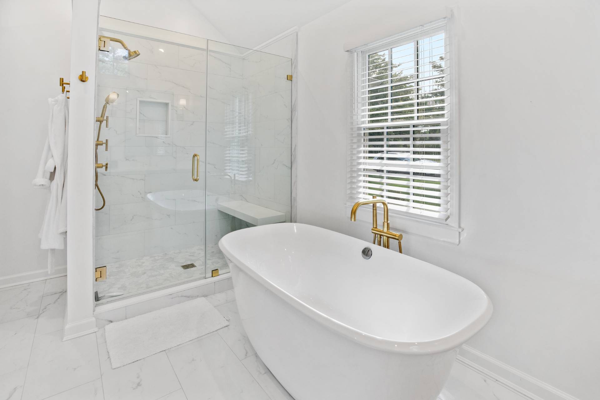 29 Cornell Road Sag Harbor, NY 11963 - Photo 11 of 26 a white bath tub sitting next to a white sink