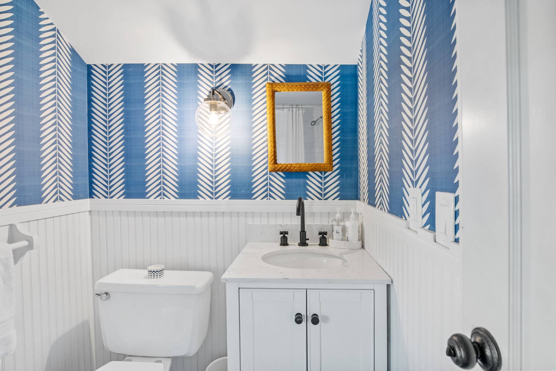 29 Cornell Road Sag Harbor, NY 11963 - Photo 17 of 26 a bathroom with a sink a mirror and a toilet
