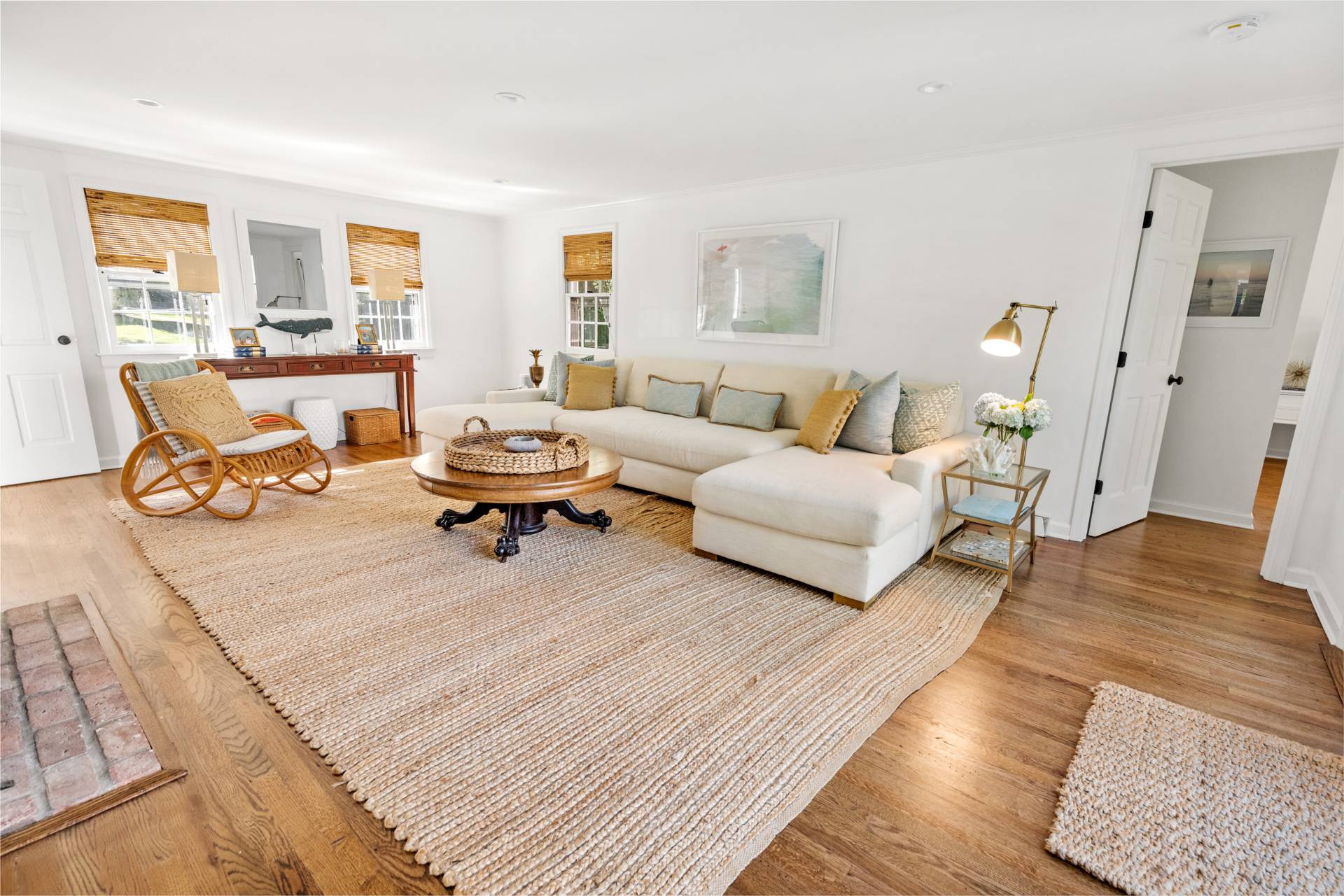 29 Cornell Road Sag Harbor, NY 11963 - Photo 4 of 26 a living room with furniture and a large window