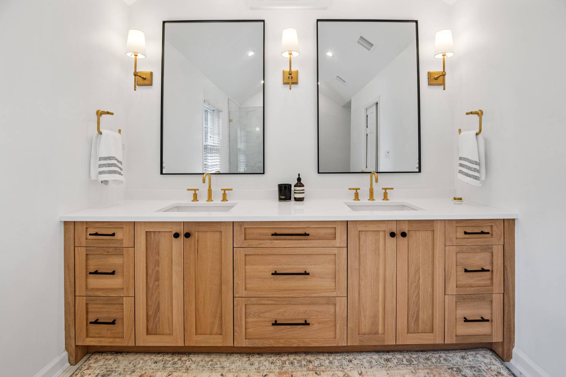 29 Cornell Road Sag Harbor, NY 11963 - Photo 10 of 26 a bathroom with a sink vanity and mirror