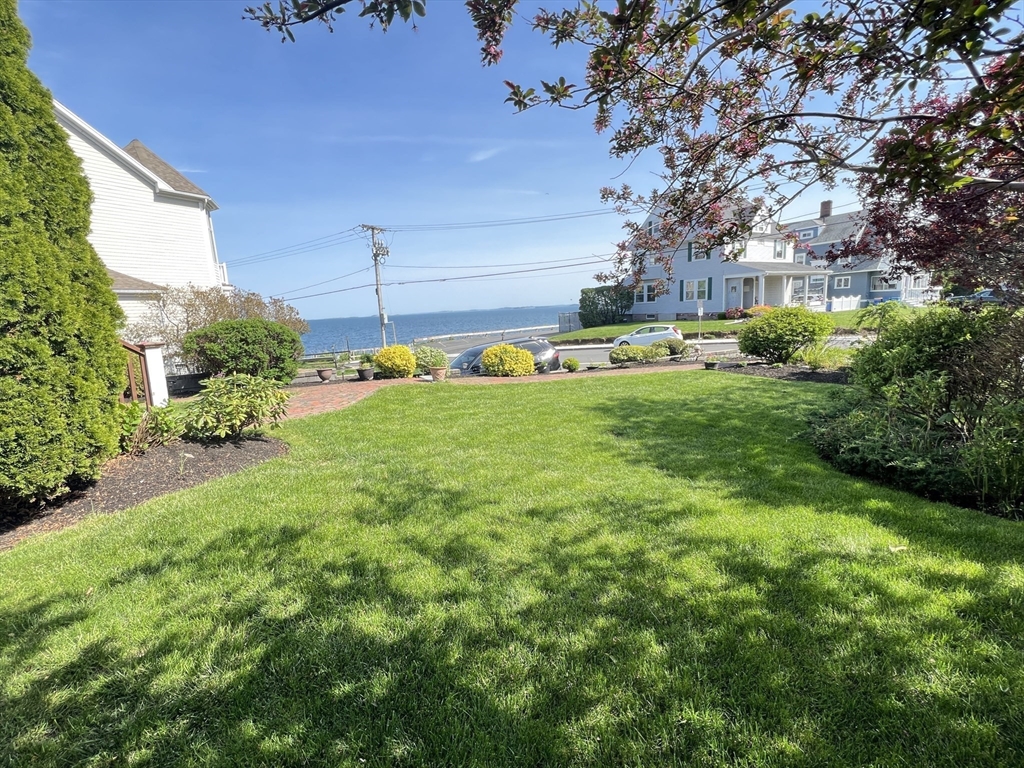 141 Grovers Avenue, Unit 141 Winthrop, MA 02152 - Photo 20 of 21 a view of a garden with a slide