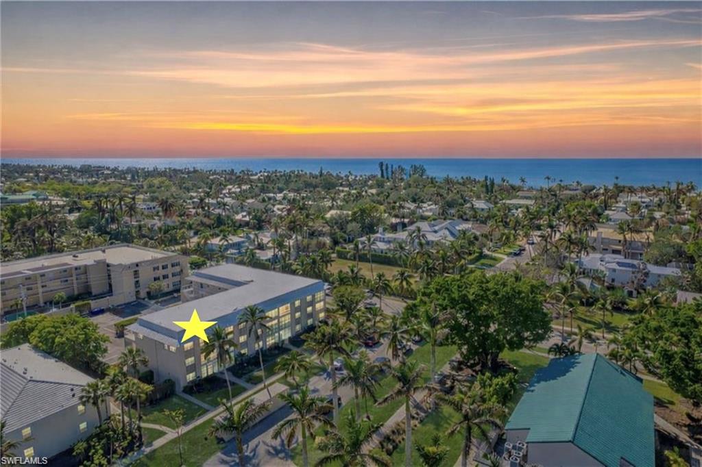 1021 3rd Street South, Unit 310 Naples, FL 34102 - Photo 25 of 27 Bird's eye view of a large body of water