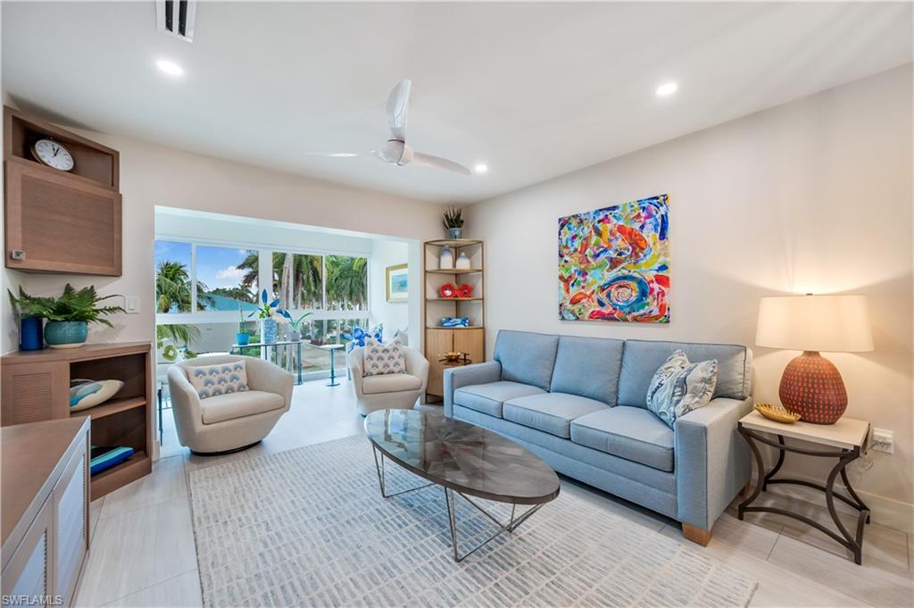 1021 3rd Street South, Unit 310 Naples, FL 34102 - Photo 7 of 27 Living room featuring recessed lighting and ceiling fan