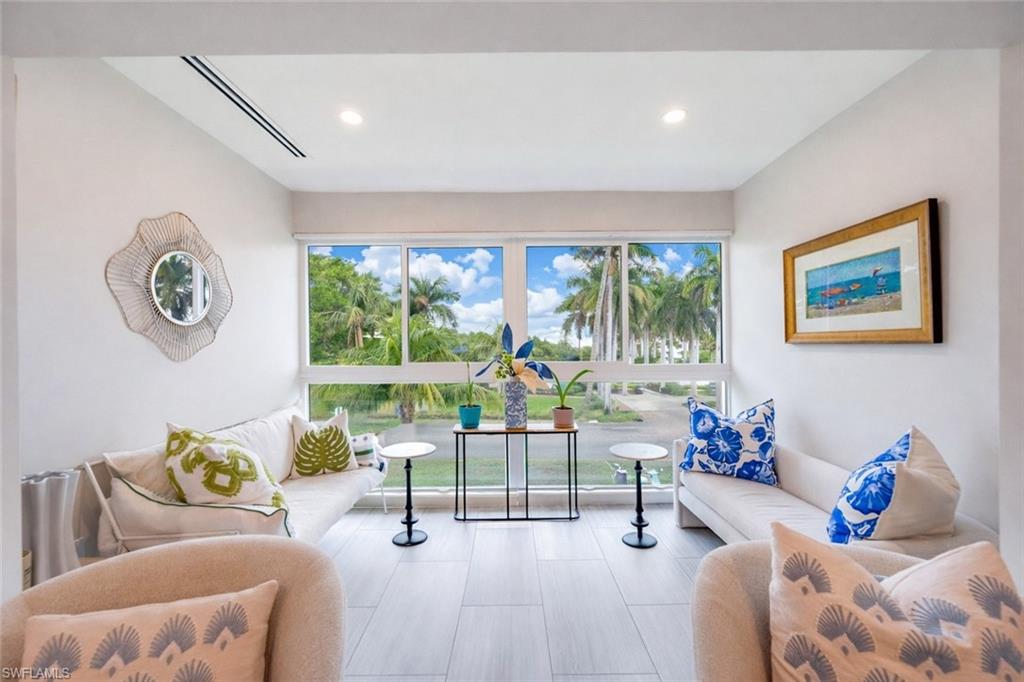 1021 3rd Street South, Unit 310 Naples, FL 34102 - Photo 8 of 27 Living area featuring recessed lighting