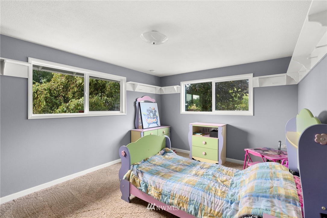 115 Kennicott Road Chehalis, WA 98532 - Photo 16 of 25 a bedroom with a bed chair and a window