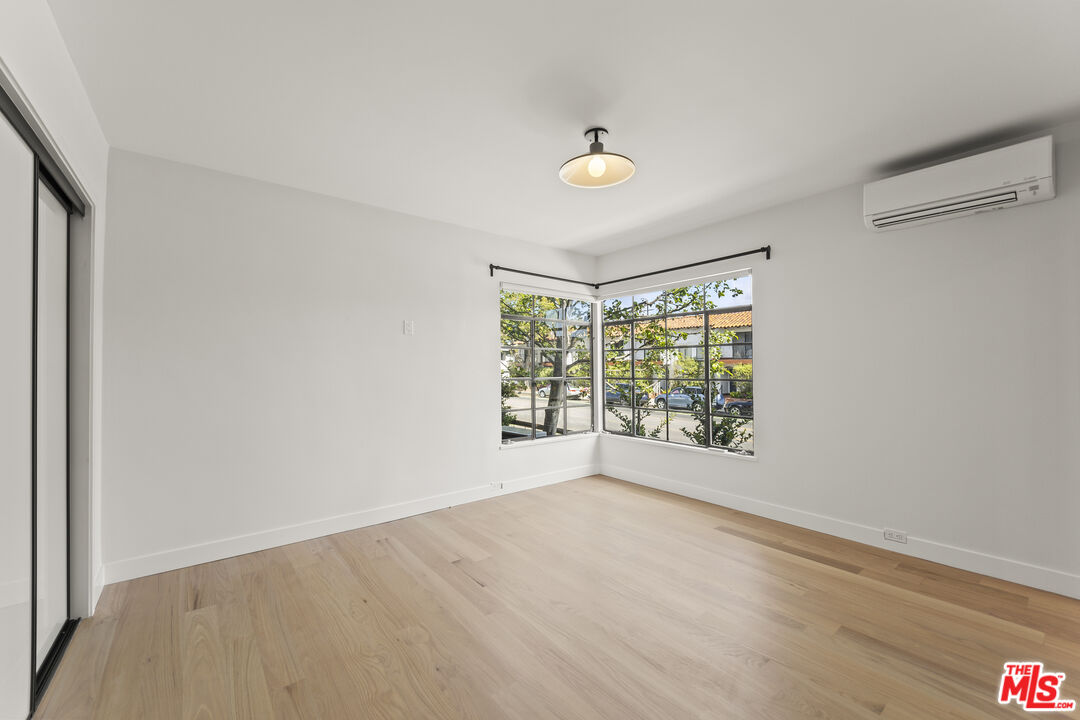 751 18th Street, Unit B Santa Monica, CA 90403 - Photo 13 of 24 a view of an empty room with a window