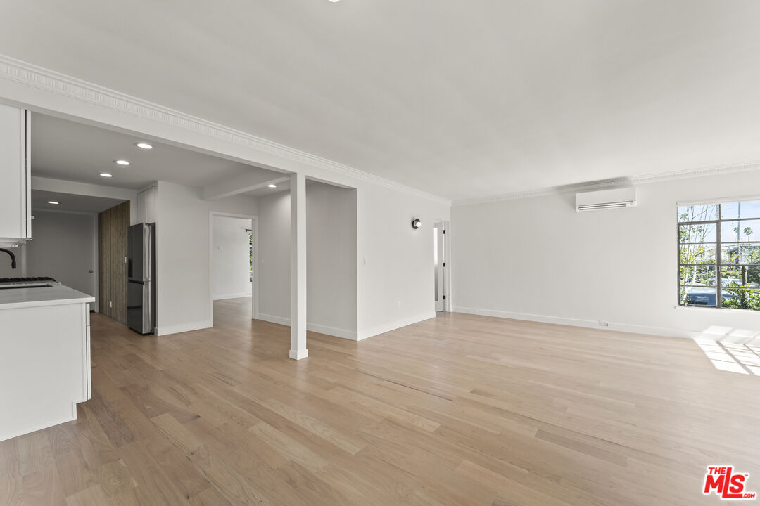 751 18th Street, Unit B Santa Monica, CA 90403 - Photo 2 of 24 a view of an empty room with a window
