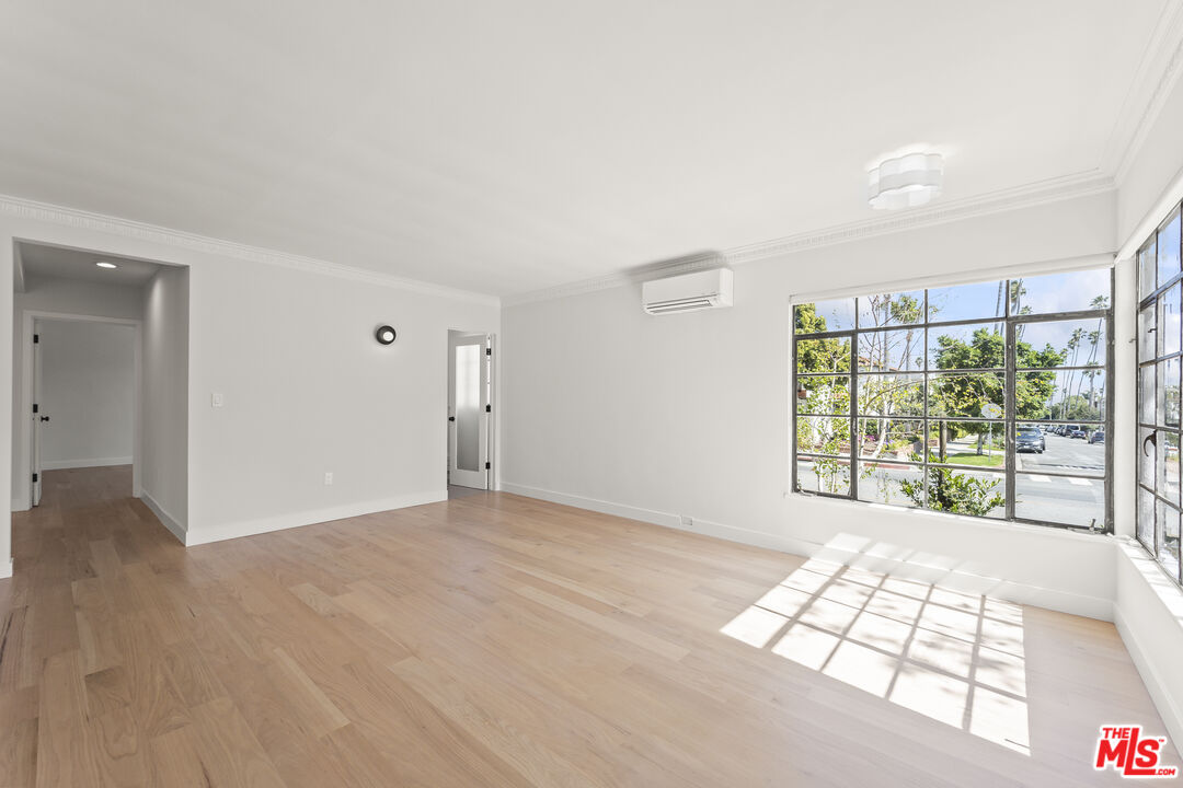 751 18th Street, Unit B Santa Monica, CA 90403 - Photo 3 of 24 a view of an empty room with a window