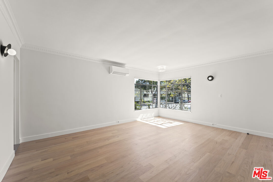 751 18th Street, Unit B Santa Monica, CA 90403 - Photo 6 of 24 a view of an empty room with a window
