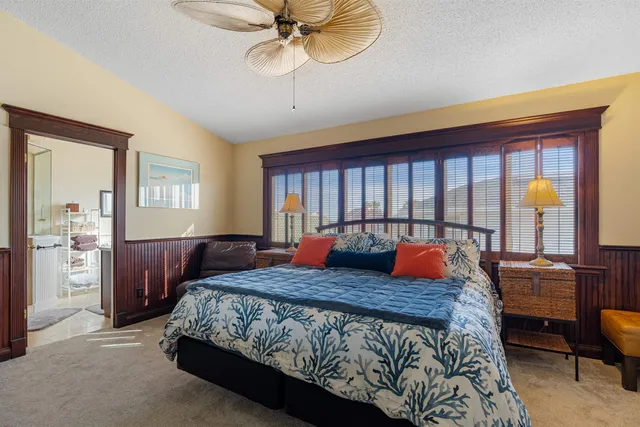 a bathroom with a sink toilet and mirror