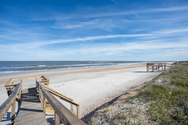 a view of swimming pool from a balcony