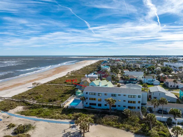 a view of a chairs and table in a room