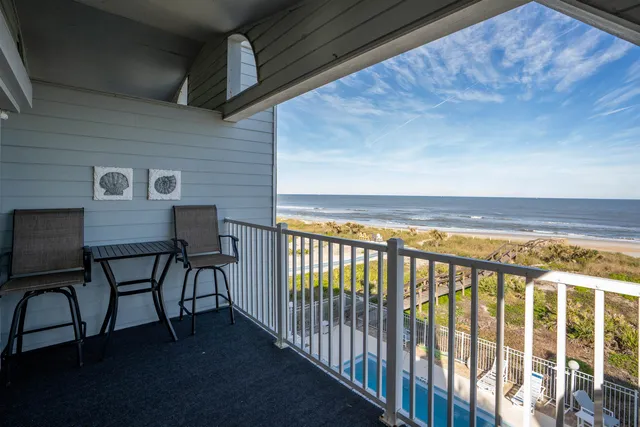 a view of a porch with furniture