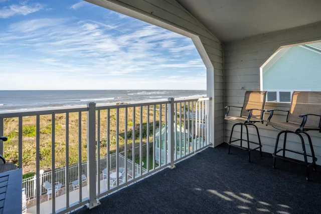 a view of a field with an outdoor space