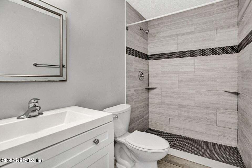 3645 Edison Avenue Jacksonville, FL 32254 - Photo 12 of 21 a bathroom with a sink toilet and shower