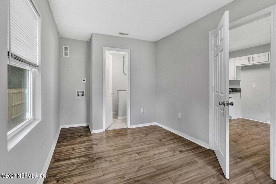 3645 Edison Avenue Jacksonville, FL 32254 - Photo 13 of 21 a view of a bedroom from a hallway