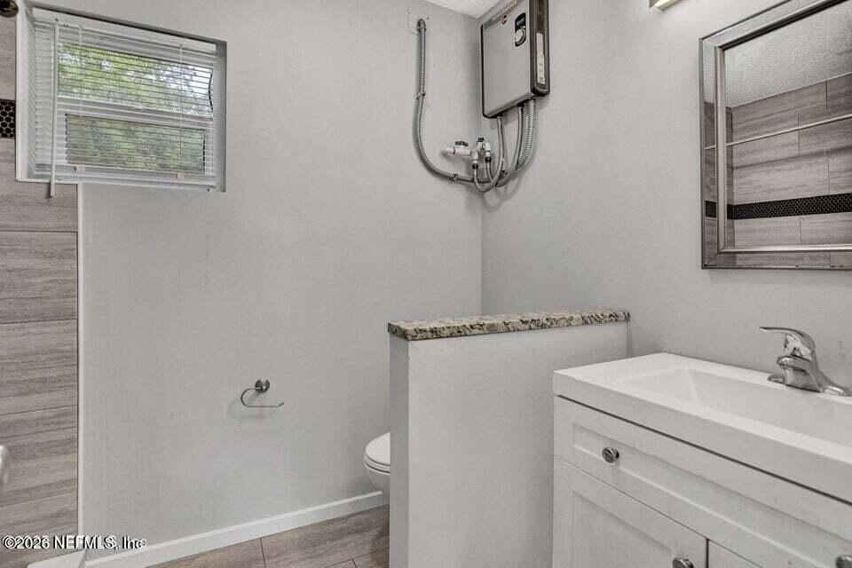 3645 Edison Avenue Jacksonville, FL 32254 - Photo 14 of 21 a bathroom with a shower and a sink
